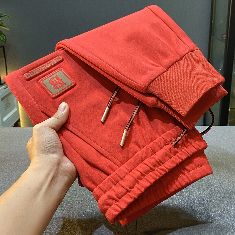 Calça de moletom com faixas de tornozelo bonito masculino, calça casual, elástica na moda, calça esportiva combinando com tudo, solta, vermelha, nova, 2024