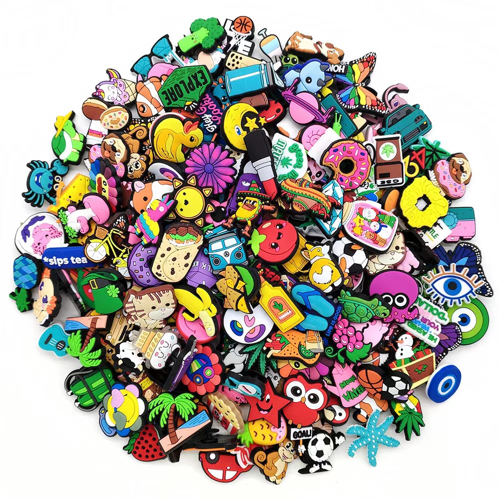 30/50/100pcs lot randon PVC shoes charms funny cartoon Accessories  Decorations man kids gifts Wristbands Unisex Gif