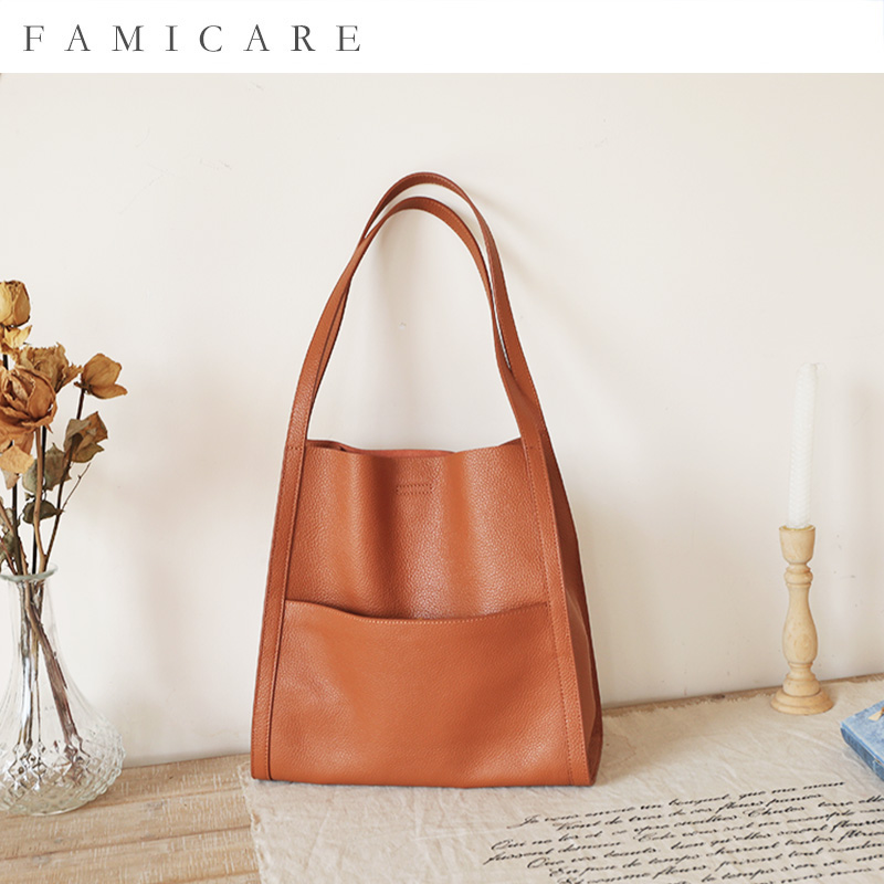 2025 nova bolsa feminina de luxo moda sacos ombro senhora macio 100% couro genuíno nicho design tote balde bolsa