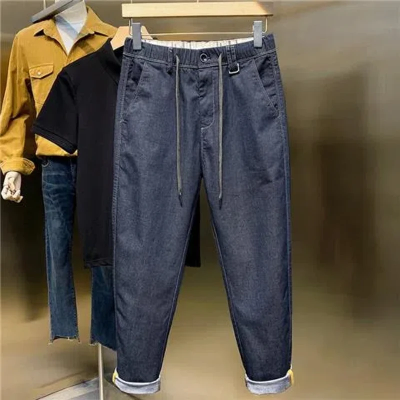 Primavera otoño pantalones en la entrepierna nueva moda Color sólido cintura elástica Jeans ropa de hombre cordones bolsillos Chaopai Casual suelto