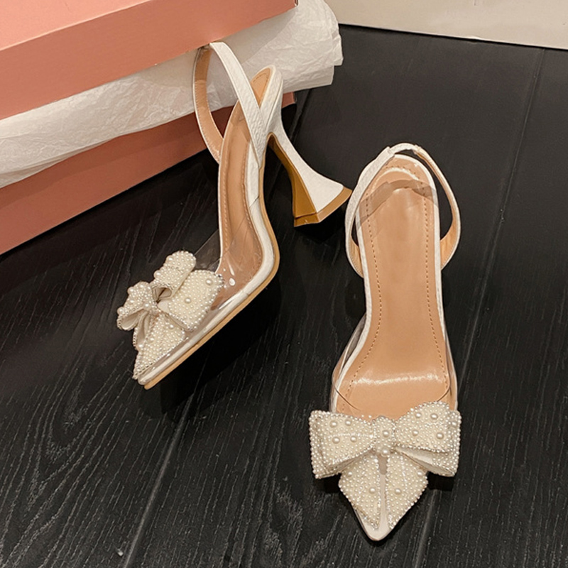 Liyke แฟชั่นการออกแบบสีขาวมุก Bowknot ผู้หญิงปั๊มเซ็กซี่ Pointed Toe รองเท้าส้นสูงงานแต่งงานรองเท้า PVC โปร่งใสรองเท้าแตะหญิง