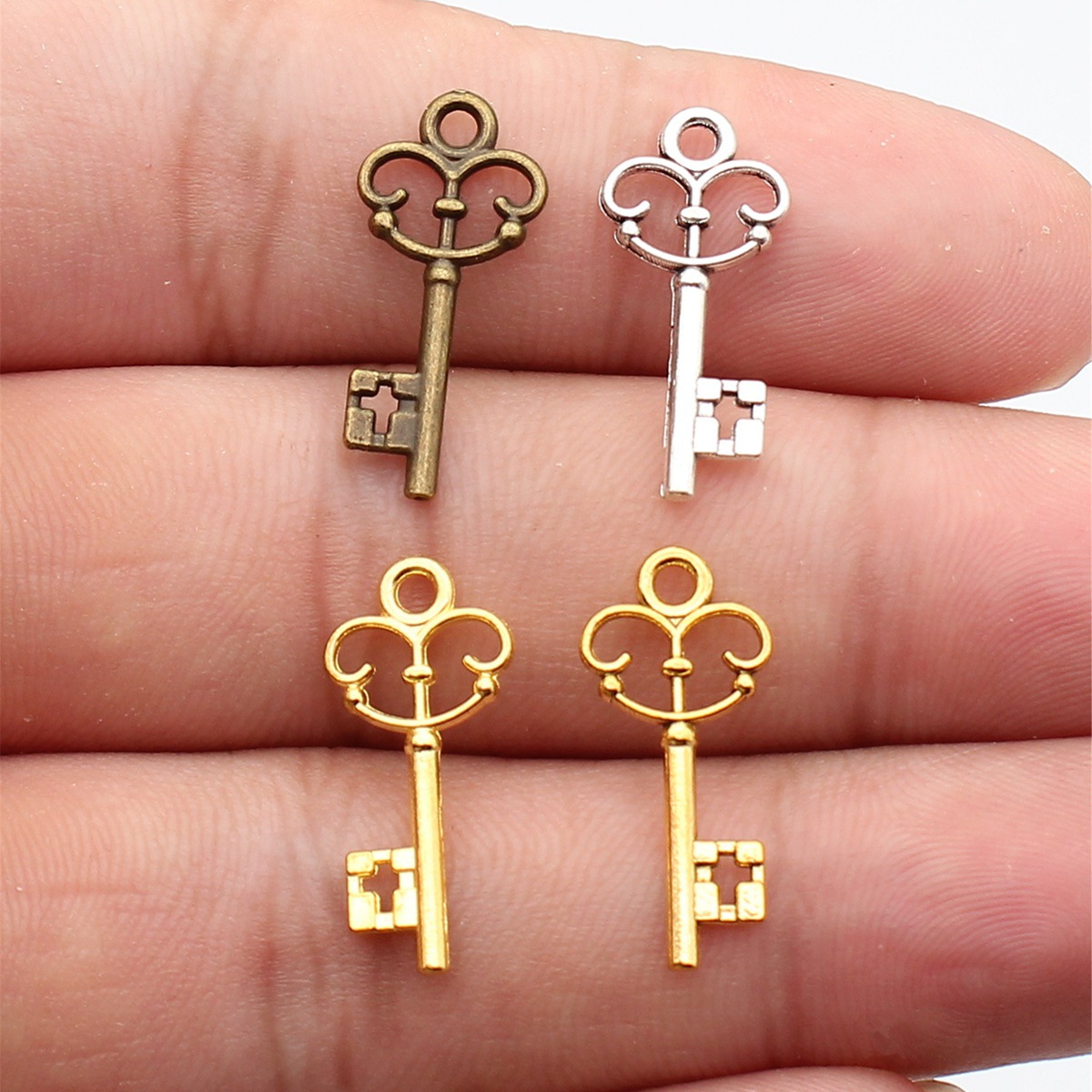 WYSIWYG 20 piezas 10x23mm 4 colores Colgantes de llave de moda para hacer joyas, accesorios de joyería DIY