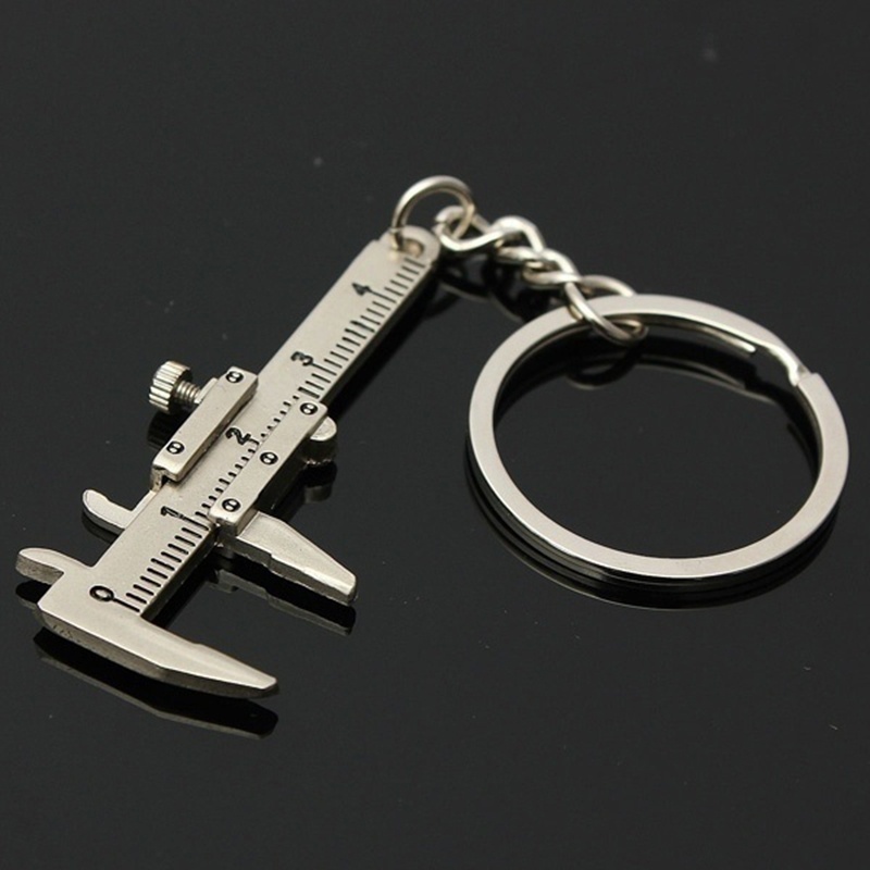 Nueva moda llave de coche Mini Vernier calibrador portátil 0-40mm llavero herramientas de medición coche Turbo llavero anillo regla calibrador
