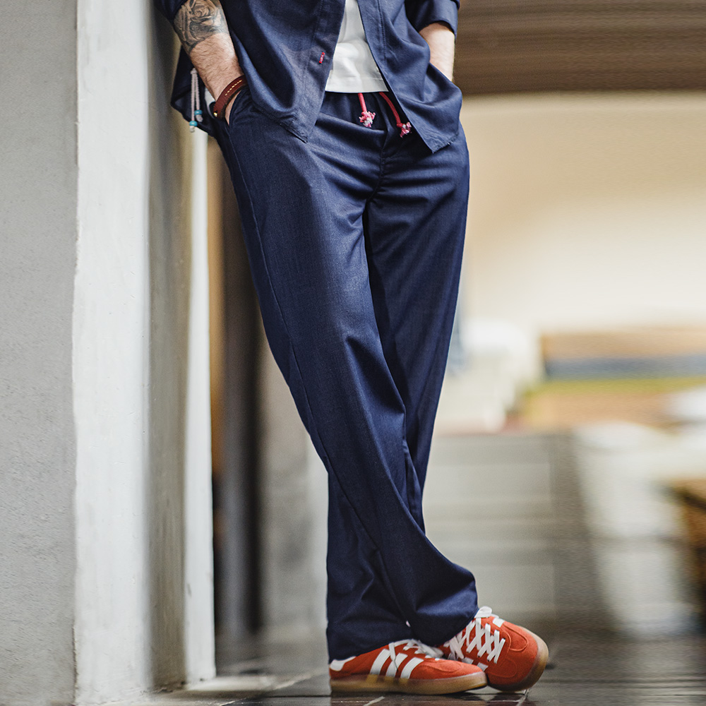 Pantaloni in Denim dritti Casual larghi da uomo Vintage Maden pantaloni lunghi traspiranti a vita media con pantaloni elastici in vita tinta unita
