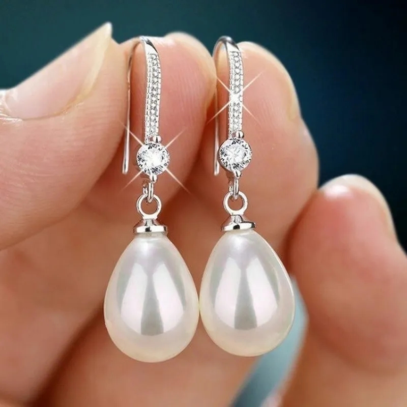 2025 Elegante en modieuze dames waterdruppel imitatie parel oorbellen rood en wit rond ovaal bruiloft sieraden verjaardagscadeaus
