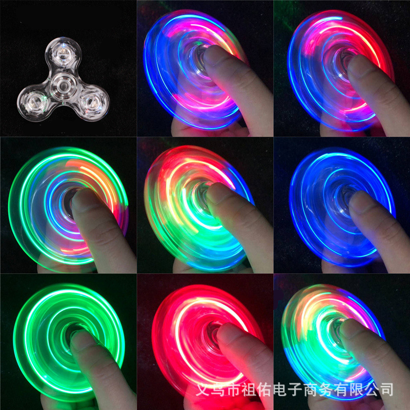 Nuevo cristal luminoso luz LED Fidget Spinner mano Top Spinners que brilla en la oscuridad juguetes para aliviar el estrés giroscopio cinético para niños