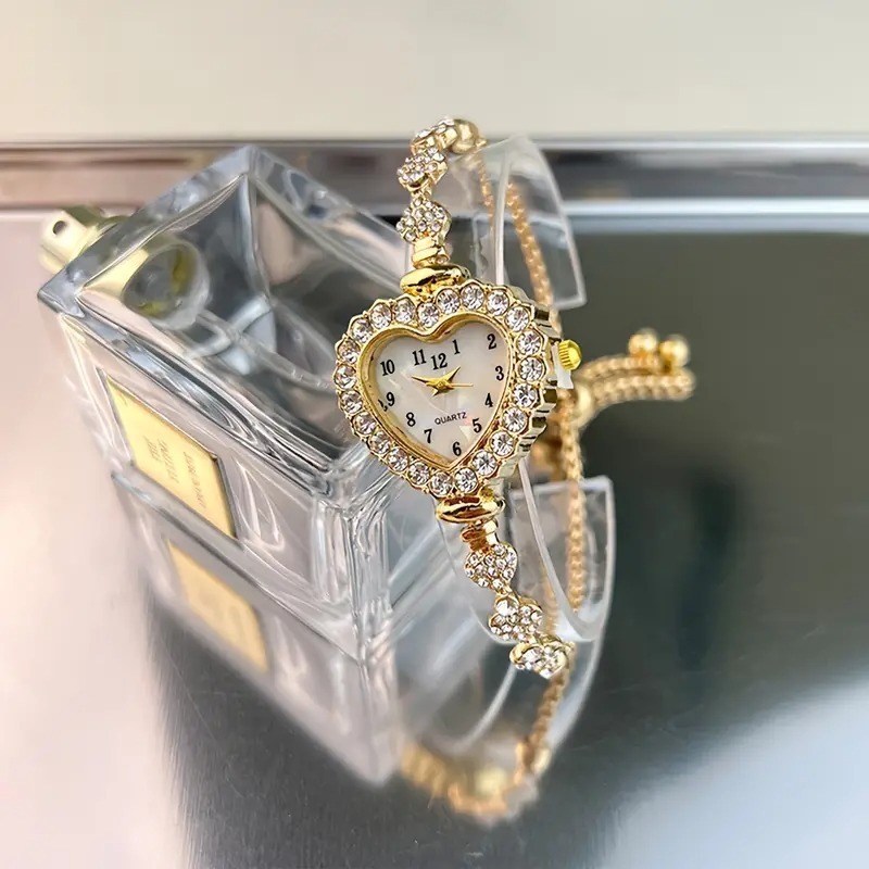 Reloj de moda para mujer, pulsera de mujer con incrustaciones de diamantes, exquisito reloj de cuarzo con diamantes de imitación a la moda.