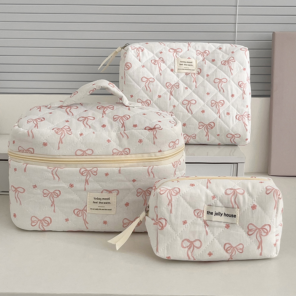 Nueva moda Bowknot mujeres bolsa de maquillaje acolchada bolso portátil bolsa de almacenamiento de artículos de tocador cosméticos bolso de mano flor bolsas de algodón con cremallera