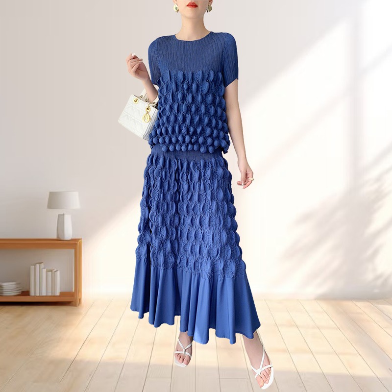 Nieuwe korte mouw handgemaakte bubble geplooide Miyake-stijl pak elastische taille stretch halve rok comfortabele casual mode dames