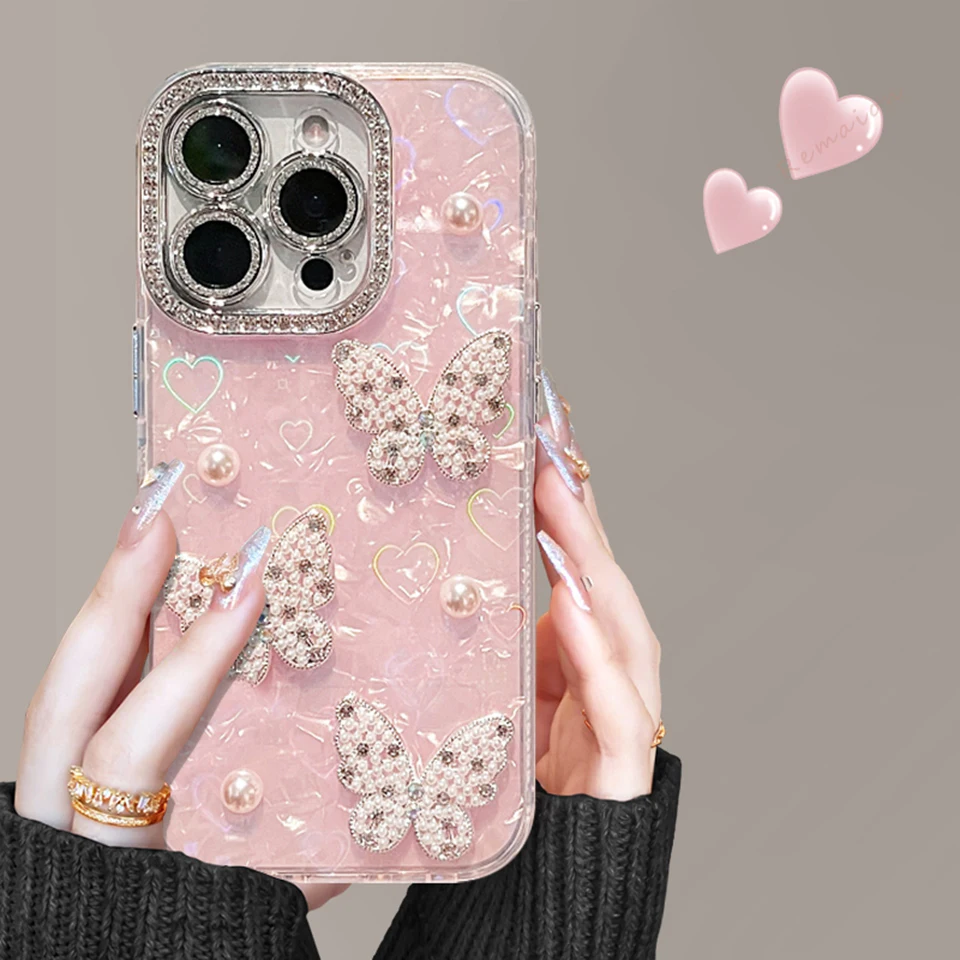 Custodia per telefono con braccialetto da polso per iPhone 15 16 14 Plus 11 12 13 14 16 Pro Max Custodia protettiva per fotocamera con diamanti a forma di cuore glitterato