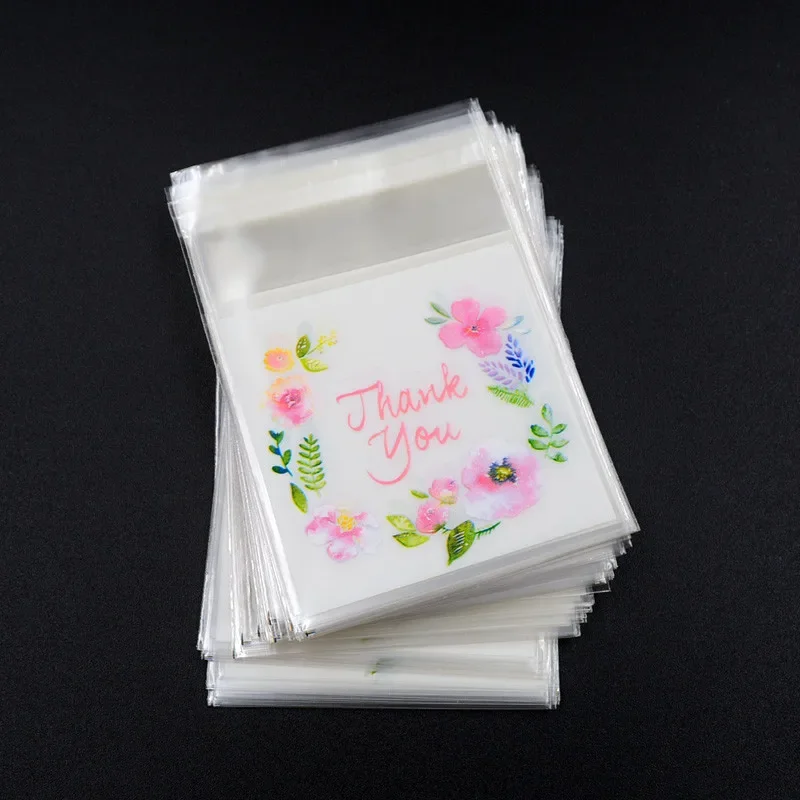 100 ชิ้น/ล็อตถุงพลาสติกขอบคุณดอกไม้ Self-Adhesive กระเป๋าสําหรับโฮมเมดคุกกี้ของขวัญ DIY เครื่องประดับบรรจุภัณฑ์กระเป๋า