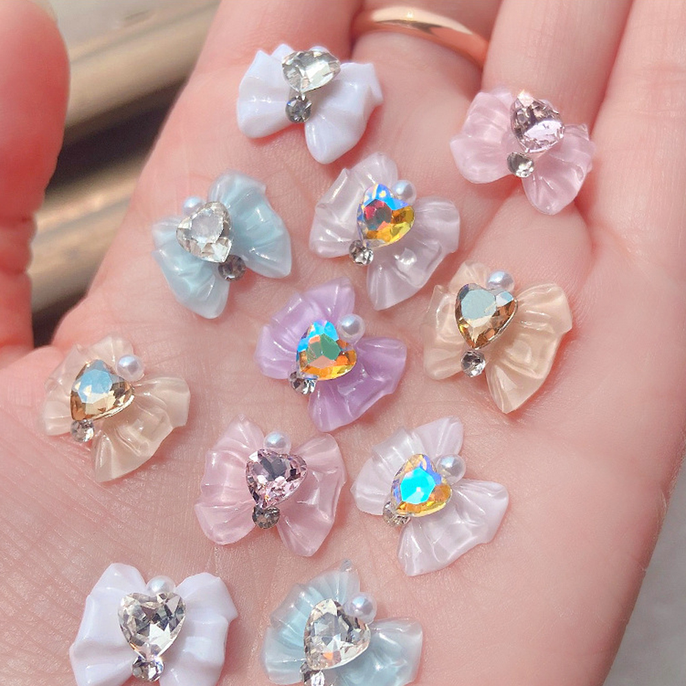 10 buah hiasan seni kuku ikatan simpul 3D lucu kristal es mengkilap hati cinta berlian permata mutiara pita dekorasi kuku Aksesori kuku DIY