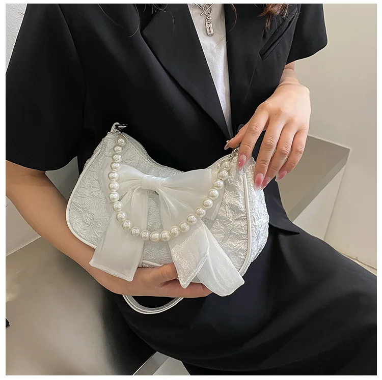ไข่มุกหญิงกระเป๋าRetro Luxury Designerกระเป๋าถือCrossbodyกระเป๋าแฟชั่นผ้าใบผู้หญิง2024แนวโน้มไหล่กระเป๋า