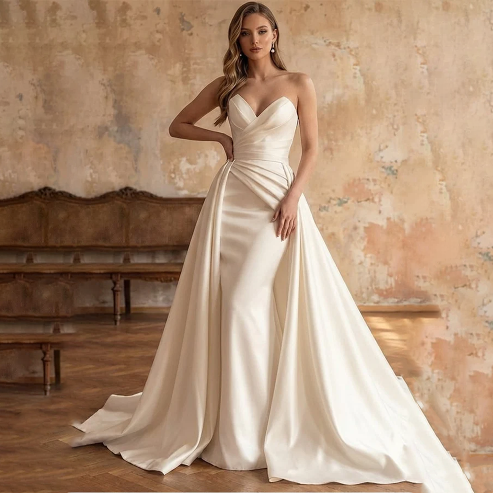 2026 Strand Sexy Sweetheart Plissierte Meerjungfrauen-Brautkleider Elegant Abnehmbarer Schleppe Ärmellos Bodenlang Rückenfrei Maßgeschneidert