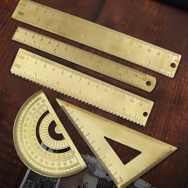 Ensemble de dessin professionnel en laiton: règle triangulaire, rapporteur, courbe française, étrier à bord droit en cuivre, outils de dessin vintage