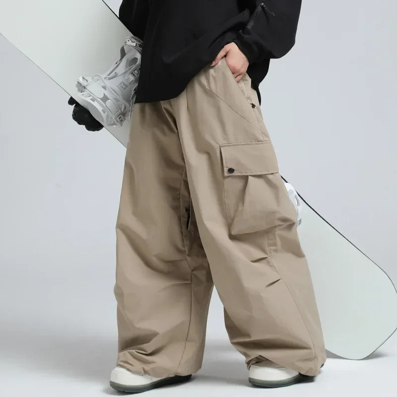 Homens macacão inverno ao ar livre calças de neve feminino solto snowboard wear impermeável à prova de vento calças de esqui quente feminino roupas de esqui