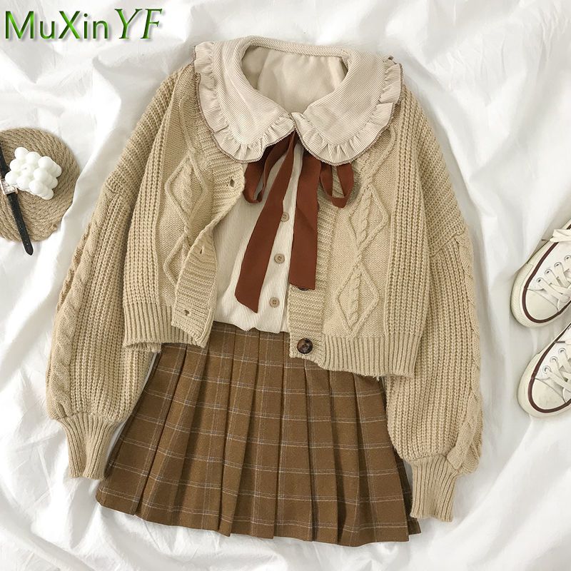 Nuovo set di abbigliamento per studenti autunno inverno giacca in maglia stile preppy da donna coreana camicia con colletto alla Peter Pan minigonna scozzese abiti