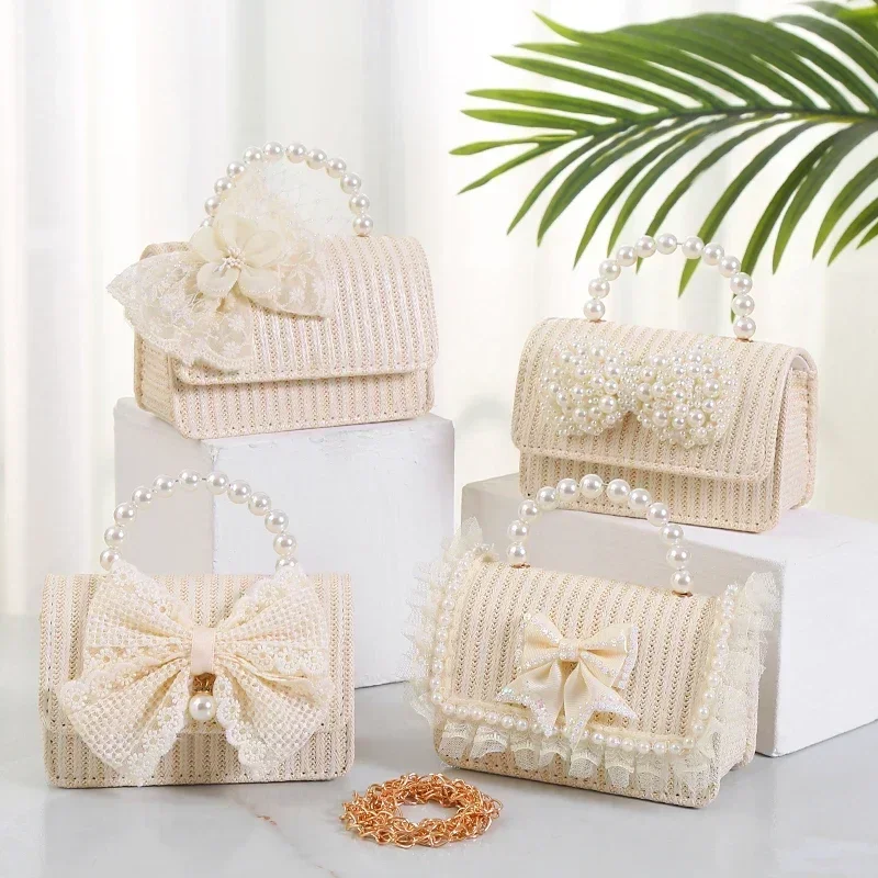 Mini bolso de mano con lazo de encaje y flores para niños y niñas, bolso de hombro pequeño de paja, monedero de princesa con perlas simples, bandolera para mujer