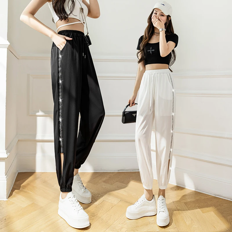 Pantaloni di seta di ghiaccio ad asciugatura rapida abbigliamento sportivo da donna estate nuova moda Casual pantaloni di sudore lucidi da donna a buon mercato all'ingrosso Dropshipping