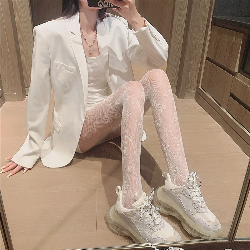 Collants sexy ajourés à motif toile d'araignée, style punk rétro, en résille classique pour femme
