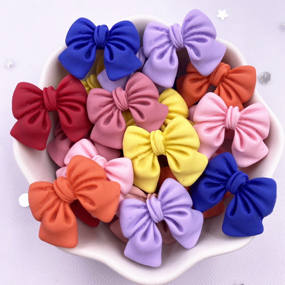 Resina kawaii colorido pintado dos desenhos animados bowknot flatback pedra estatueta 20 pçs scrapbook diy decoração acessórios para casa artesanato om201