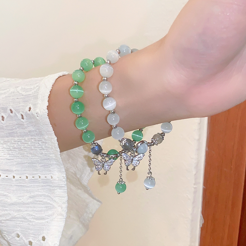 สร้อยข้อมือหินแสงจันทร์สมบัติสีฟ้าโอปอลสำหรับผู้หญิงสร้อยข้อมือเพทายหรูหราจี้ผีเสื้อเครื่องประดับกำไลข้อมือยืดหยุ่น