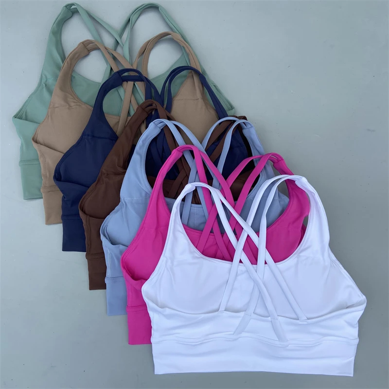 Bra Olahraga Wanita Warna Solid untuk Fitness, Yoga, dan Atletik, Model Silang Ketat, Pakaian Dalam Olahraga dengan Bantalan Dada, Berkualitas Tinggi dan Anti Guncangan