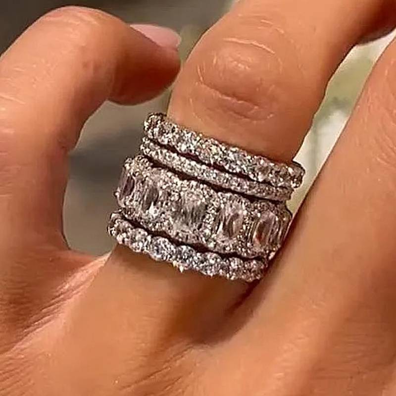 Huitan – Lot de 4 bagues élégantes pour femme, entièrement serties de zircons cubiques, accessoires de luxe pour fêtes et mariages, bijoux chics et polyvalents