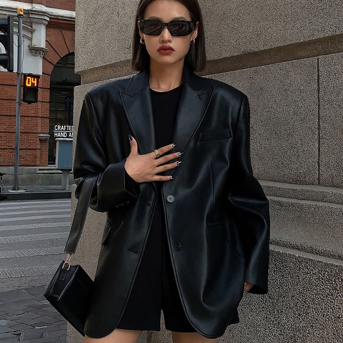 Chaqueta de traje de cuero PU negro para mujer, textura de alto grado, Color sólido, traje pequeño suelto, moda para mujer, primavera y otoño, nuevo