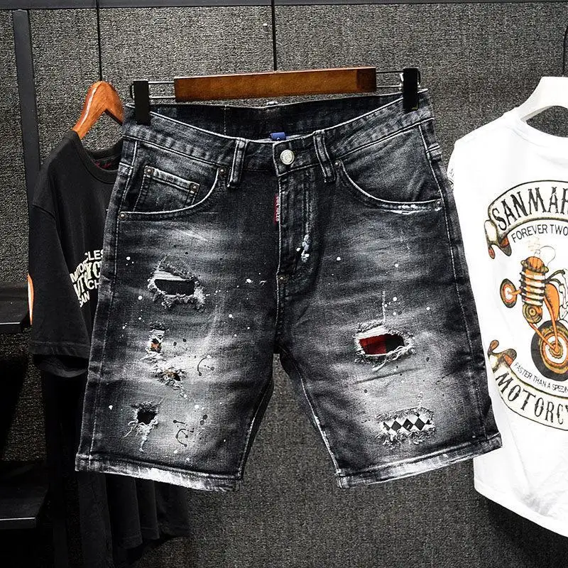 Ropa de diseñador de marca de lujo para hombre, pantalones cortos vaqueros informales hasta la rodilla, moda de verano 2024, parches negros, pantalones cortos vaqueros pintados para hombre
