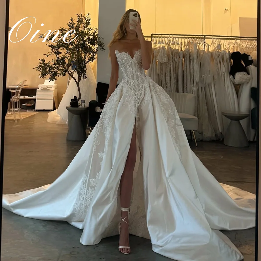 Oine Customized Elegant Sleeveless Wedding Dresses 2026 Side Slit A-Line Beading Bridal Gowns Pleat Lace Applique Wedding Gowns
