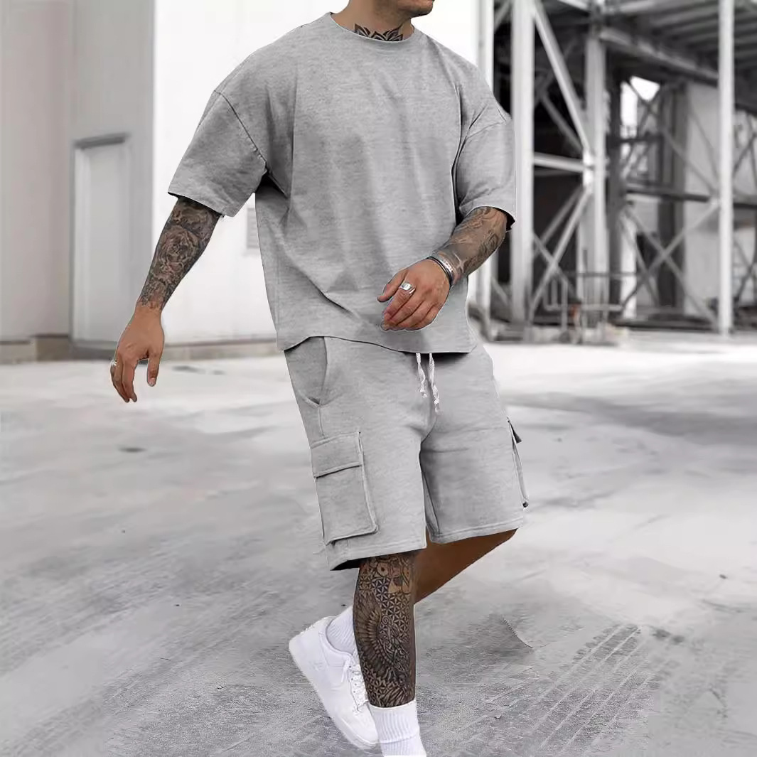 Nowy letni styl modny T-shirt i spodenki w jednolitym kolorze, swobodny i sportowy garnitur męski