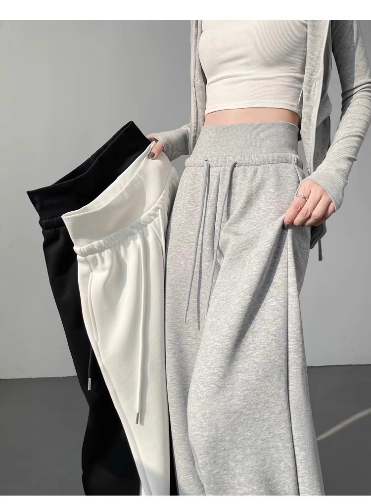 Calça esportiva feminina cinza cintura alta pendurada solta e emagrecedora perna reta calça de moletom americana.