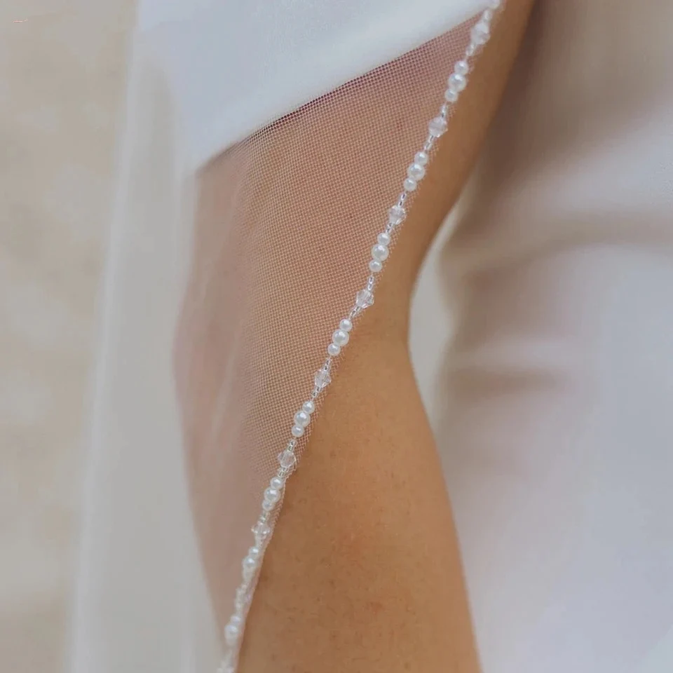 1 ชั้นผ้าคลุมหน้างานแต่งงาน Elegant Beaded Edge คริสตัลไข่มุกลูกปัด Edge Veil Ivory ยาวผ้าคลุมหน้าเจ้าสาวด้วยหวี Custom Cathedral Veil