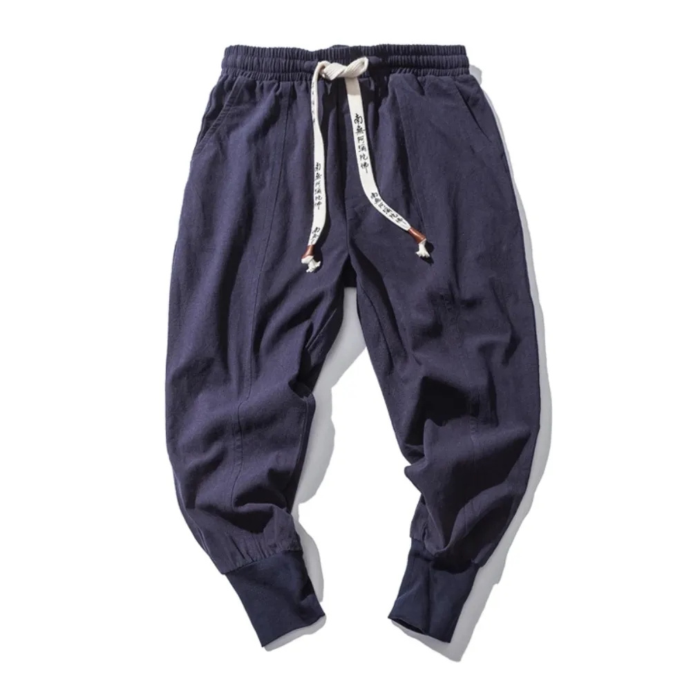 Bawełniane lniane spodnie haremowe męskie solidna w pasie Streetwear biegaczy nowe workowate spodnie z opadającym krokiem spodnie typu casual męskie