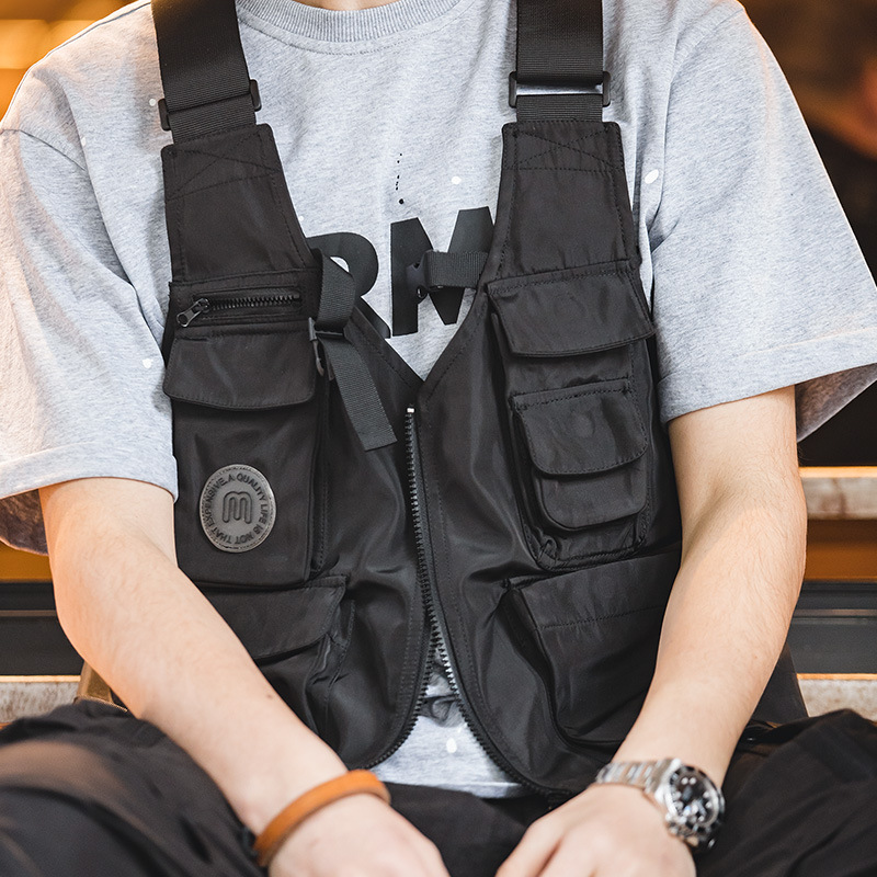 Maden เสื้อแจ็กเก็ตและกระเป๋าเสื้อเกราะยุทธวิธีผู้ชาย, กระเป๋าอเนกประสงค์สไตล์ย้อนยุคแนววินเทจเสื้อโค้ทกว้าง Tali bahu ทึบ