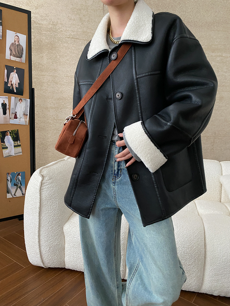 Winter women's casual solid color lapel long sleeved loose fur one-piece jacket