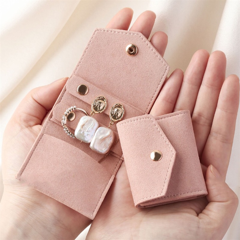 Bonito pequeno couro de microfibra sacos de armazenamento de jóias 6*5cm brinco anel charme colar organizador presentes promocionais bolsas