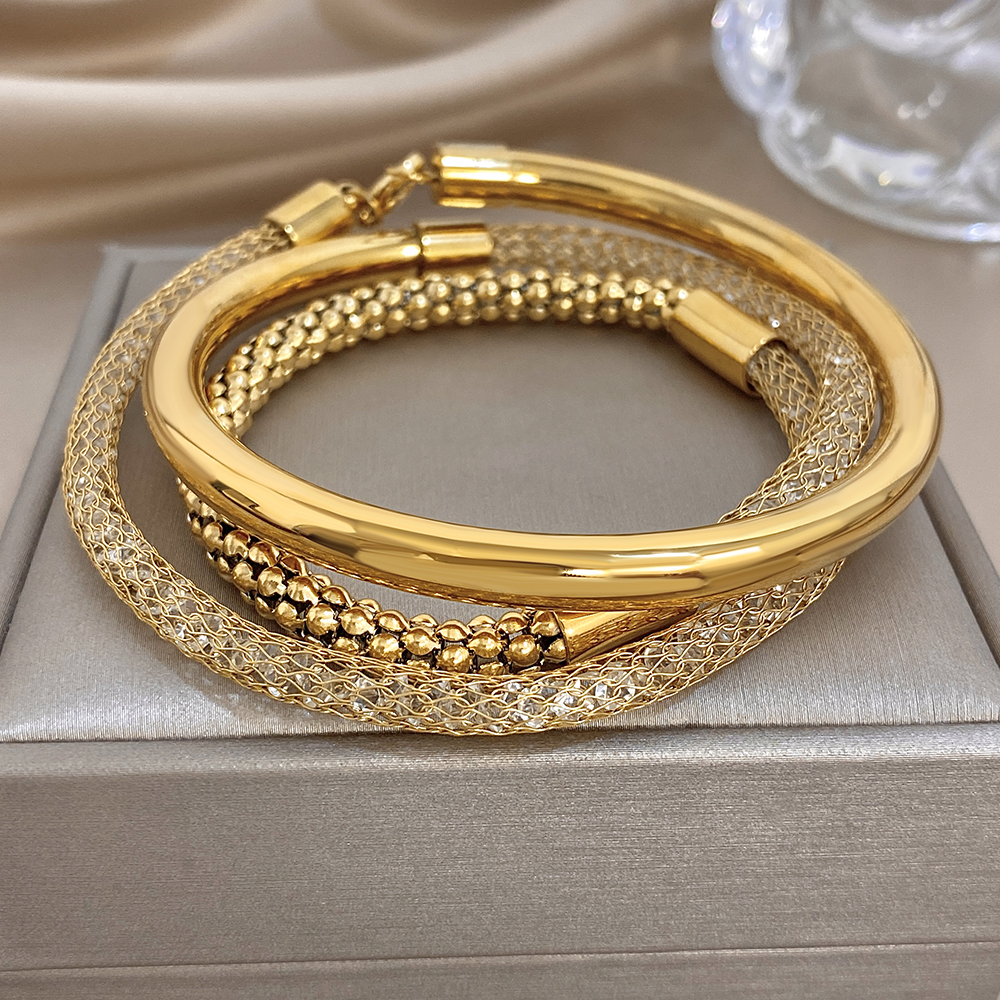 Squisiti braccialetti multistrato in acciaio inossidabile per le donne Eleganti gioielli da festa con bracciale a rete cava placcato oro