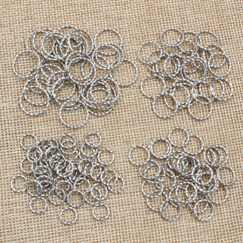 50 szt. Ze stali nierdzewnej o grubości 1/1.2mm 6 8 10 12 14mm skrętne otwarte pierścienie do robienia biżuterii DIY na kolczyki naszyjnik