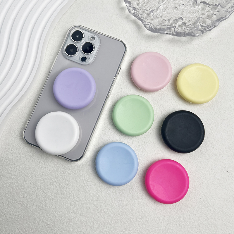 Macaron einfarbiger Silikon-Handy-Griffständer, farbiger, ausziehbarer, faltbarer Desktop-Handyständer aus Silikon