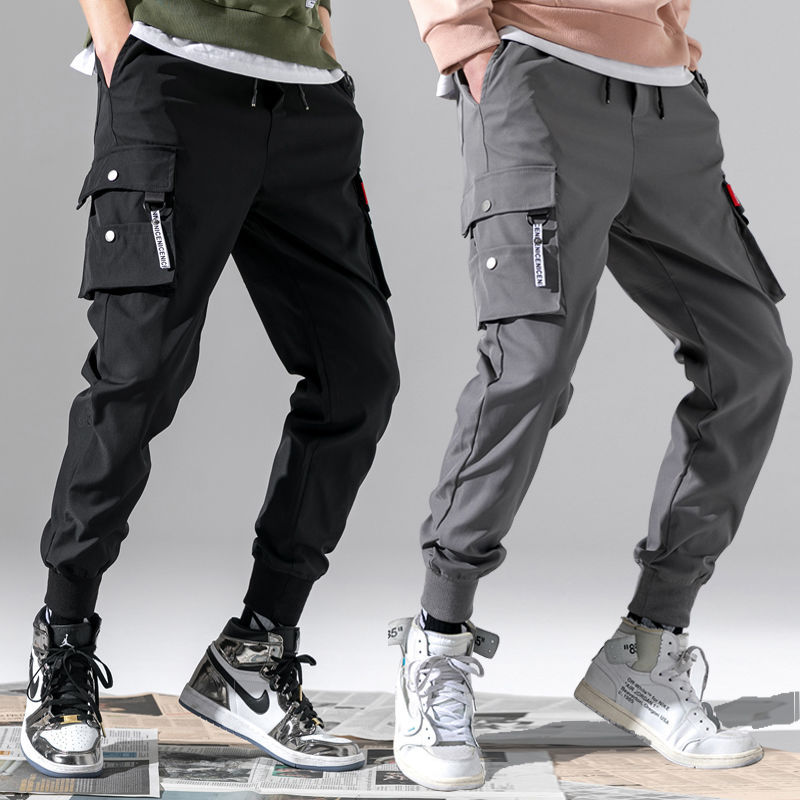2025 Nuovi pantaloni alla moda in tinta unita, pantaloni cargo da uomo con tasca multipla, pantaloni larghi casual da esterno, pantaloni da lavoro da uomo oversize