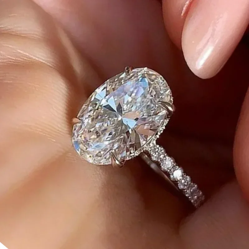 Bague en zircone cubique ovale incrustée en forme d'œuf de pigeon 2026, bijoux de fiançailles en platine tendance et personnalisés de haute qualité