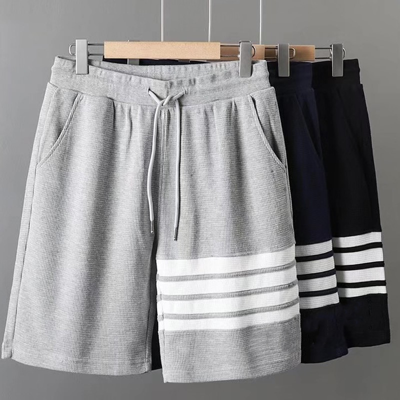 Pantalones cortos de cuatro barras para hombre, estilo gofrado, novedad de verano, a la moda, deportivos y de ocio, pantalones de cinco cuartos para hombre, transfronterizos.