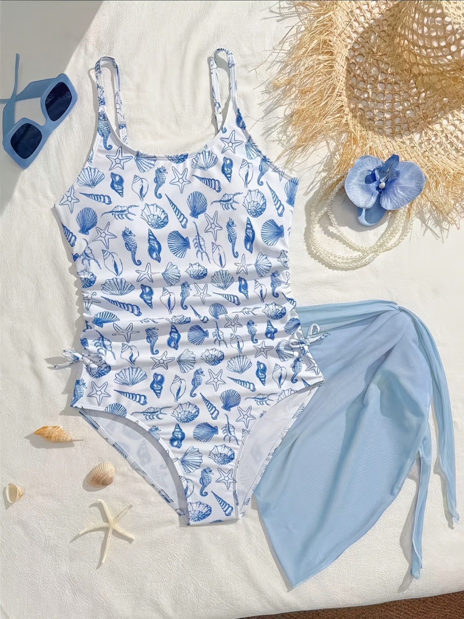 Traje de baño para niñas con elementos de conchas, caballitos de mar y estrellas de mar, traje de baño de una pieza con estampado completo, tela suave y cómoda, azul claro con estampado completo, adecuado para niños de 8 a 12 años para vacaciones en la pl