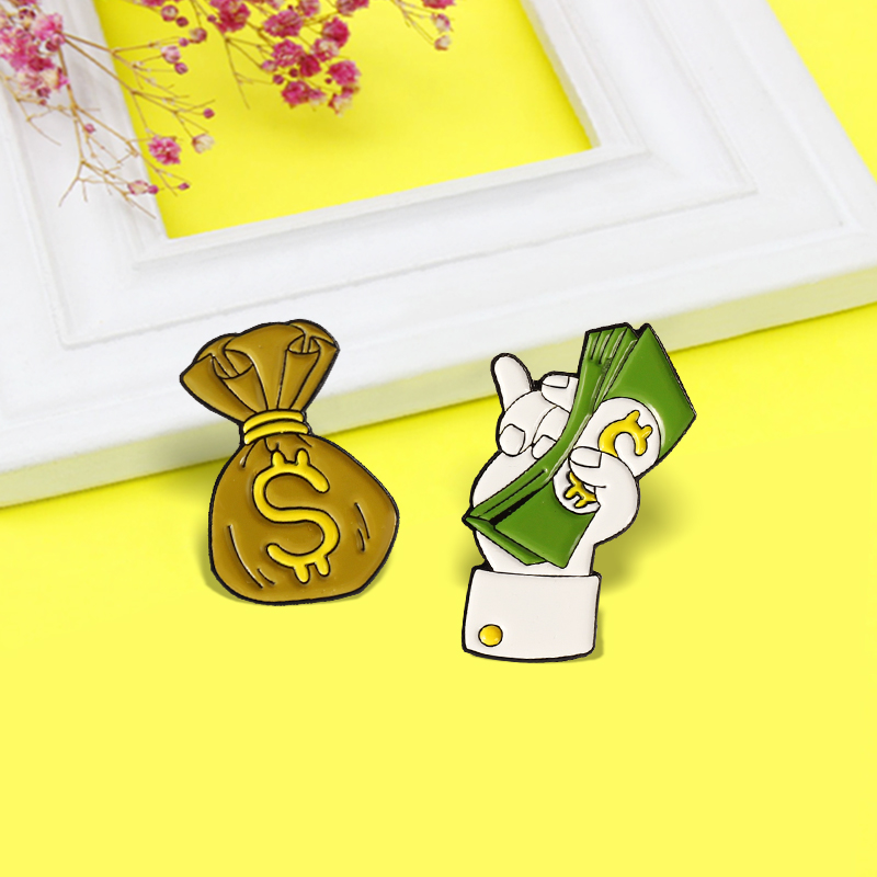 Cartoon $ Dollaro Borsa Spilla smaltata Ali d'angelo Banconota Borsa portamonete in oro Spille Zaino con risvolto Distintivo Gioielli Accessori regalo