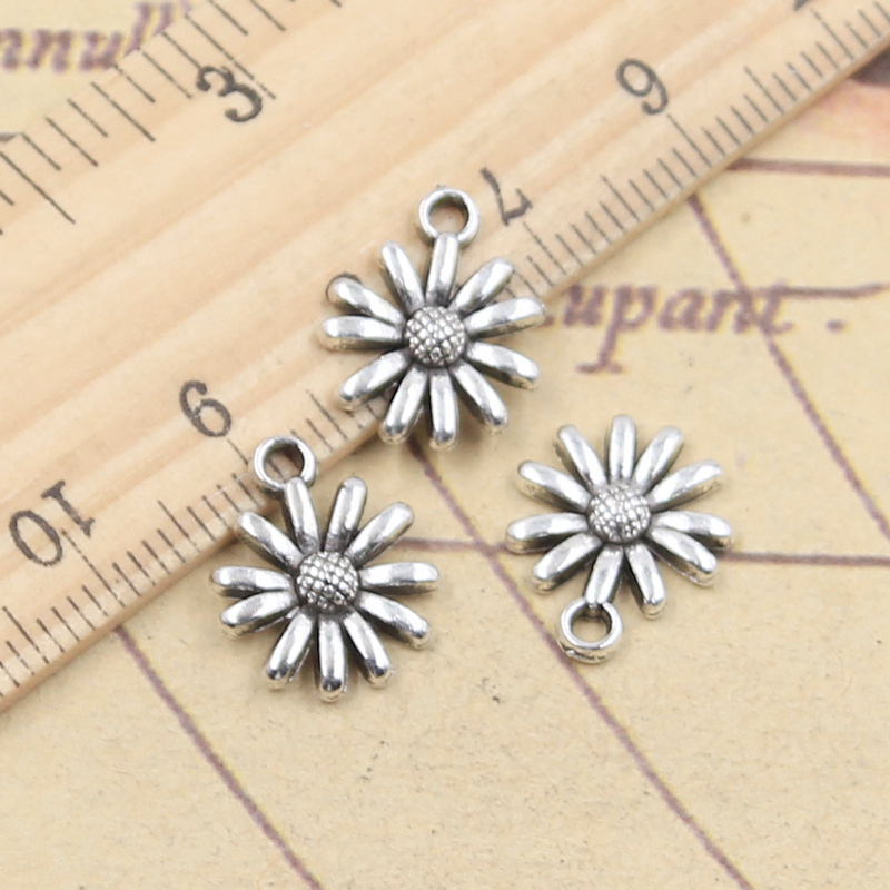 20 pezzi di ciondoli margherita fiore girasole 14x12mm pendenti color argento tibetano creazione di gioielli antichi artigianato fatto a mano fai da te