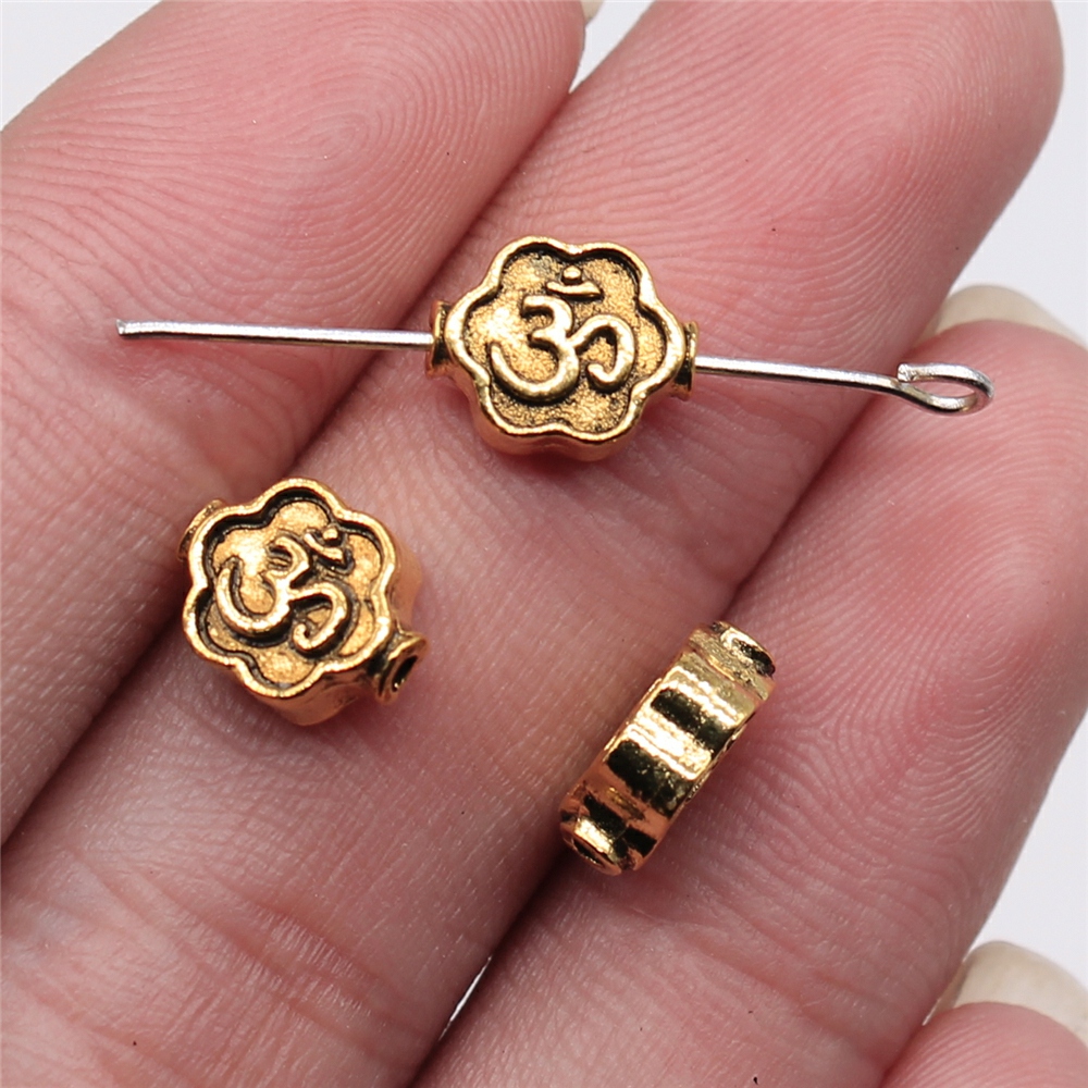 WYSIWYG 10 pz 8x4mm Colore Oro Antico Om Piccolo Foro Perline Per Creazione di Gioielli Risultati Dei Gioielli FAI DA TE