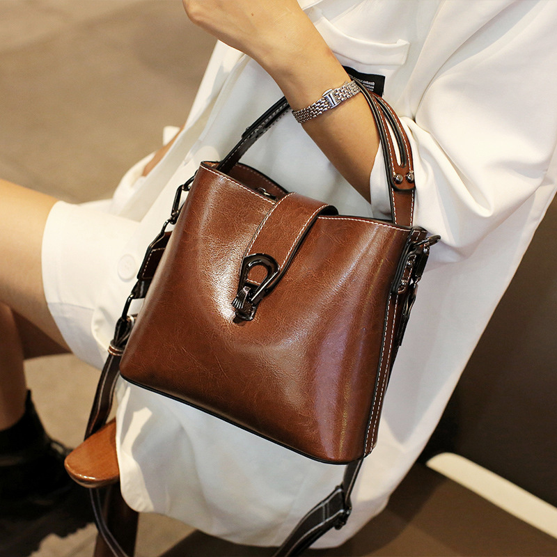 Bolsa de couro de vaca verdadeira feminina, bolsa mensageiro de ombro único, bolsa versátil, casual tiracolo, moda senhora, nova